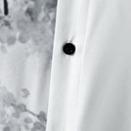 Detalhe do botão e do acabamento da camisa masculina Vinser Ipanema branca
