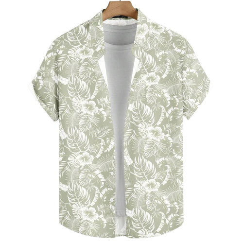 Vista frontal da Camisa Vinser Alvorada, com estampa tropical em folhas e flores brancas sobre fundo verde-sálvia, manga curta, tecido leve e acabamento premium.