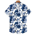 Vista frontal da Camisa Vinser Azul Imperial, com estampa floral em tons de azul sobre fundo branco, destacando a modelagem de manga curta, o caimento leve e o acabamento premium da peça.