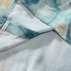 Detalhe interno da Camisa Vinser Brisa Marítima, destacando o acabamento das costuras e a qualidade da confecção em tecido estampado nos tons de azul, verde e bege.