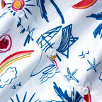 Detalhe dos botões e da estampa tropical da camisa masculina Vinser Canoa branca.