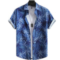Vista frontal da Camisa Vinser Costa Azul, com estampa tropical de coqueiros em tons de azul, modelagem de manga curta e tecido leve para um visual elegante e descontraído.