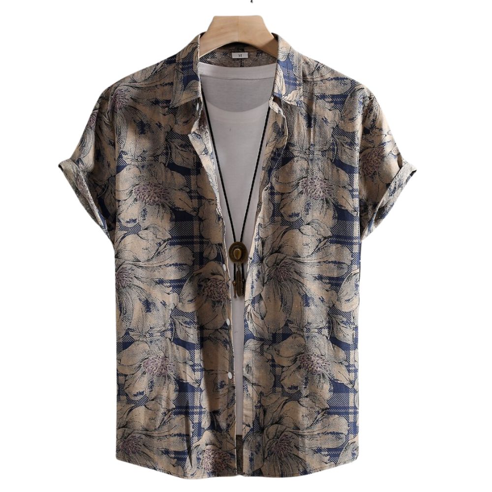 Vista frontal da Camisa Vinser Costa Serena, com estampa floral em tons de bege, marrom e azul, modelagem de manga curta e caimento leve para um visual elegante e casual.