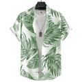 Vista frontal da Camisa Vinser Costa Verde com estampa tropical em folhas verdes sobre fundo branco, modelagem de manga curta e caimento leve.