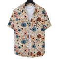 Vista frontal da Camisa Vinser Flores do Paraíso, com estampa floral multicolorida sobre fundo bege, manga curta, tecido leve e acabamento premium.