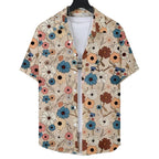 Vista frontal da Camisa Vinser Flores do Paraíso, com estampa floral multicolorida sobre fundo bege, manga curta, tecido leve e acabamento premium.