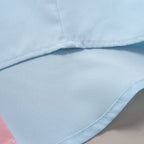 Detalhe do acabamento e costura da Camisa Vinser Florianópolis em tecido azul
