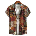 Camisa masculina Vinser Itamaracá com estampa étnica em tons terrosos, detalhes geométricos e motivos tropicais.
