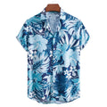 Vista frontal da Camisa Vinser Litoral Azul com estampa tropical de folhas e flores em tons de azul, azul-marinho e branco, modelagem de manga curta e gola colarinho.
