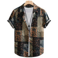 Frente da Camisa Vinser Mosaico, com estampa em patchwork de padrões geométricos e florais nos tons de preto, verde-musgo, bege e marrom, confeccionada em tecido leve com caimento confortável.