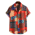 Camisa masculina Vinser Olinda de manga curta com estampa patchwork colorida em vermelho, azul, verde, laranja e tons terrosos.