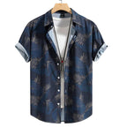 Camisa masculina Vinser Porto de Galinhas azul-marinho com estampa de folhas tropicais, modelagem de manga curta e acabamento premium