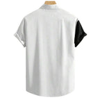 Vista traseira da Camisa Vinser Positano Branca com design bicolor em branco e preto, modelagem de manga curta, caimento leve e acabamento refinado, ideal para um visual moderno e sofisticado.