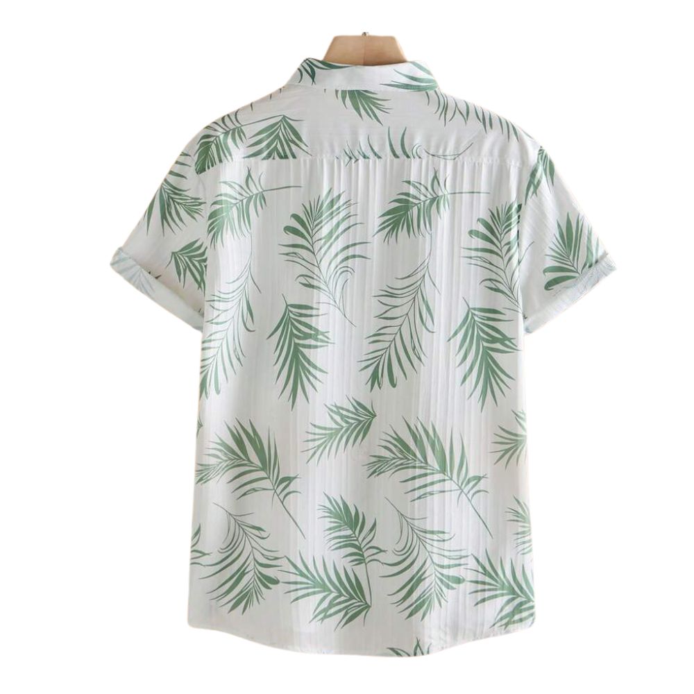 Costas da Camisa Vinser Seychelles branca com estampa tropical de folhas verdes e manga curta