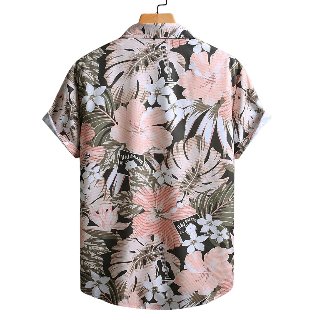 Vista traseira da Camisa Vinser Sunset Bloom, com estampa floral tropical em tons de rosa, branco e verde sobre fundo escuro, evidenciando a continuidade da estampa nas costas.