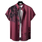 Vista frontal da camisa masculina Vinser Wine Sakura na cor vinho, com estampa inspirada em galhos de cerejeira em preto, gola padre, manga curta e tecido leve com acabamento premium.